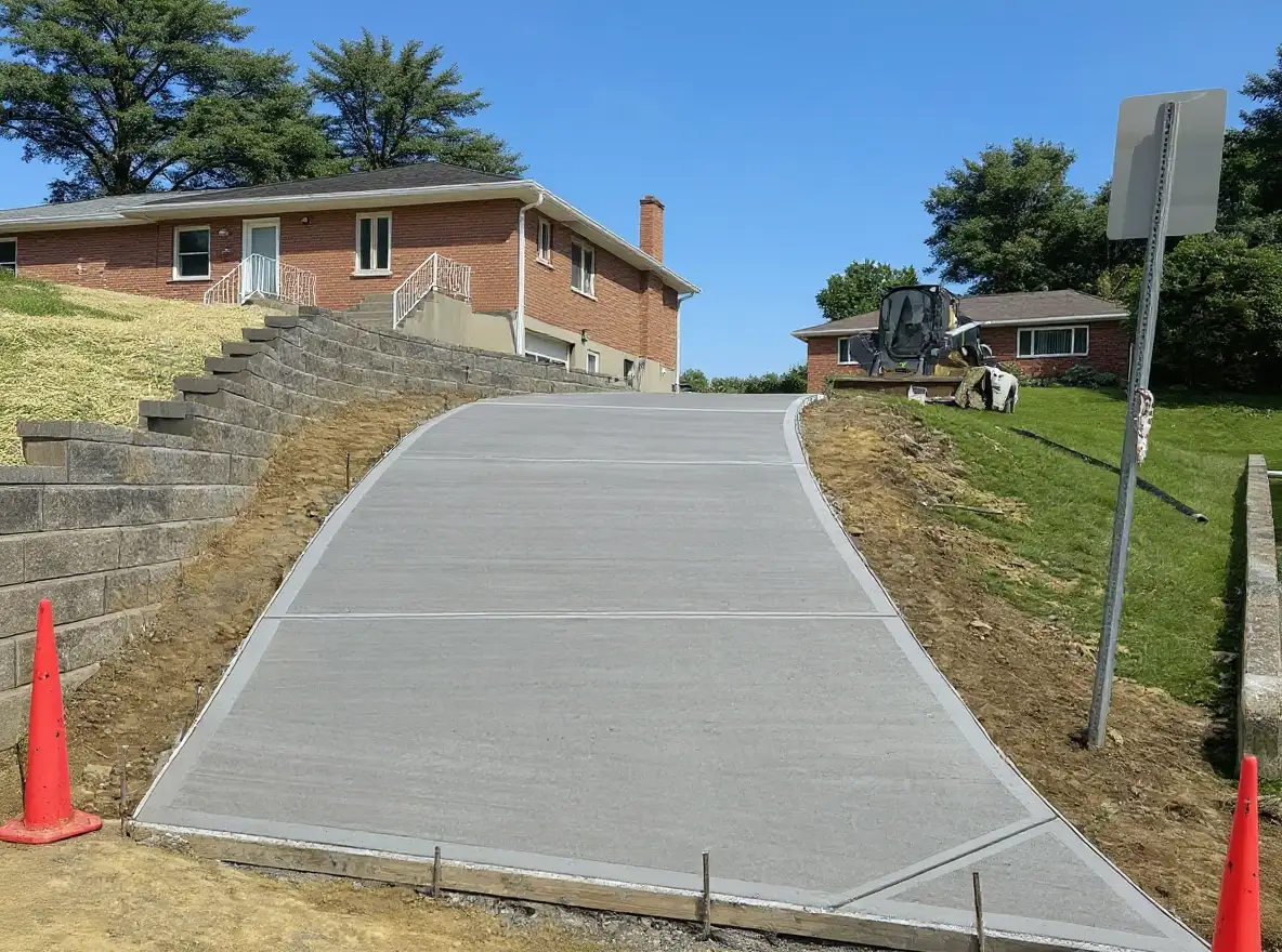 Colored sandstone concrete driveway — Ford Concrete design idea
