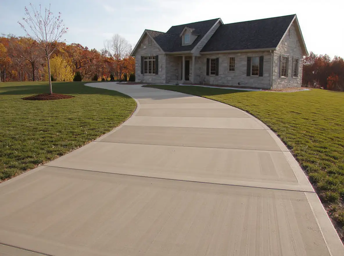 Curved concrete driveway modern farmhouse — Ford Concrete design idea