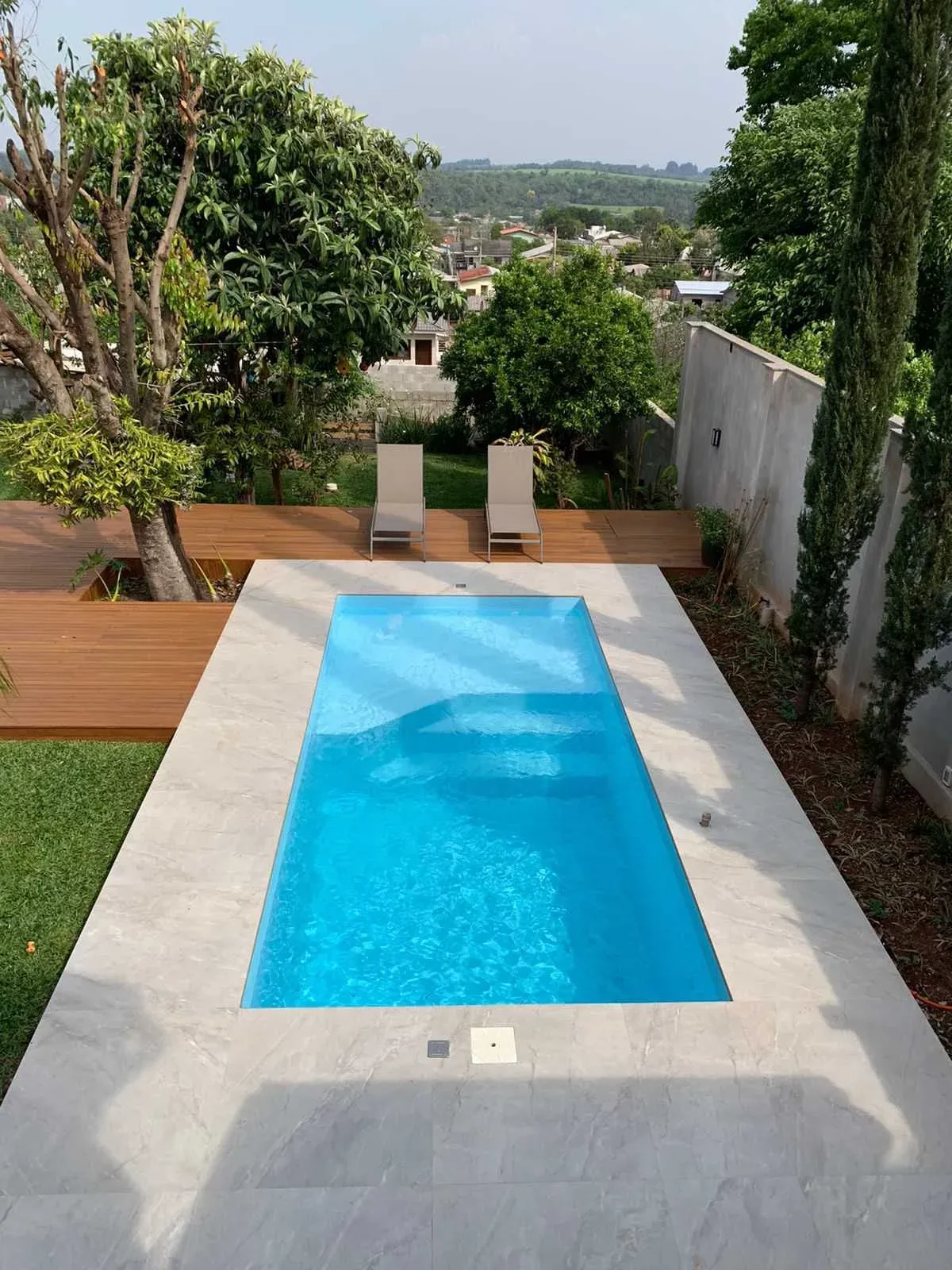 Infinity Praia fiberglass pool installed by Ford Concrete in Kansas City