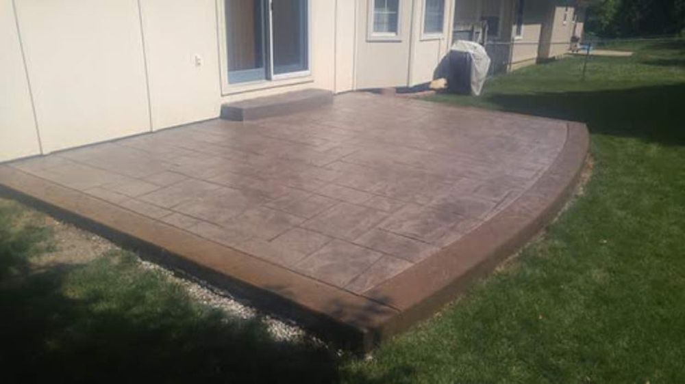 Brown stamped concrete patio at residential home — Kansas City