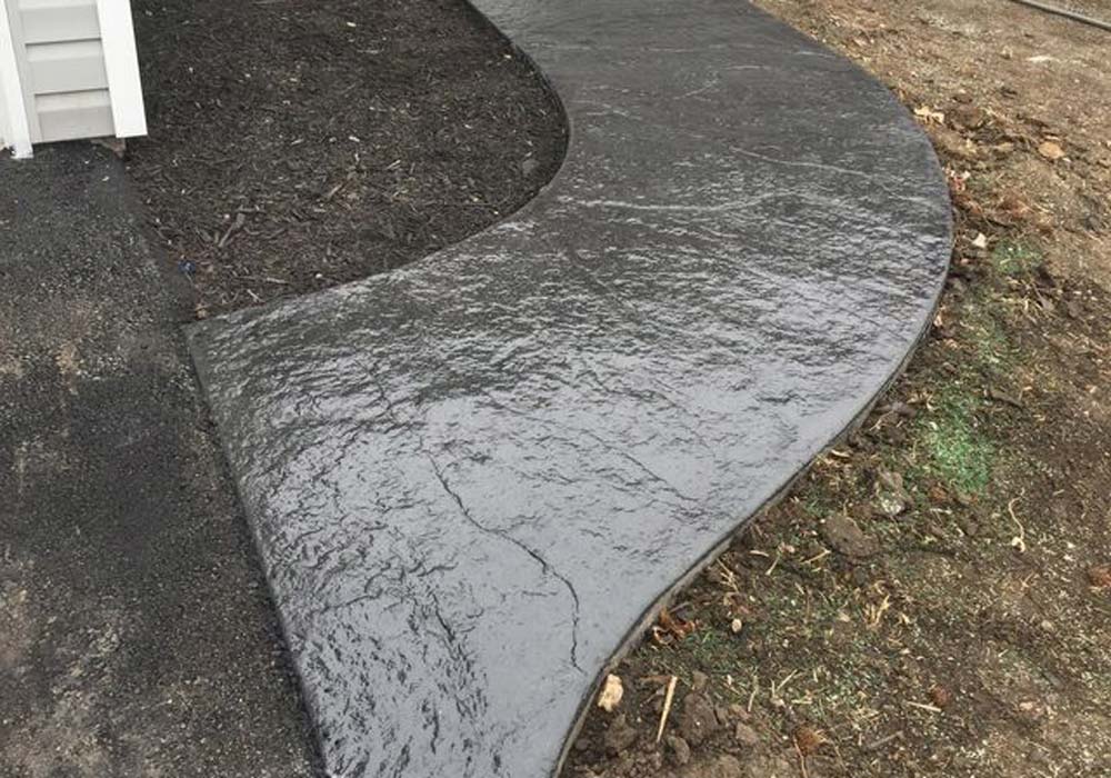 Curved stamped concrete walkway — Kansas City