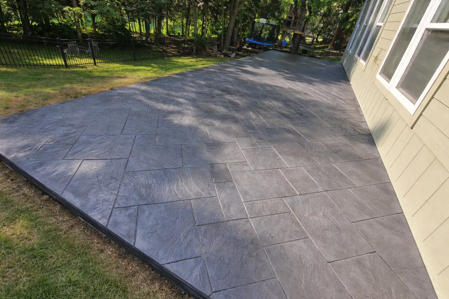 Stamped concrete patio with ashlar slate pattern — Kansas City