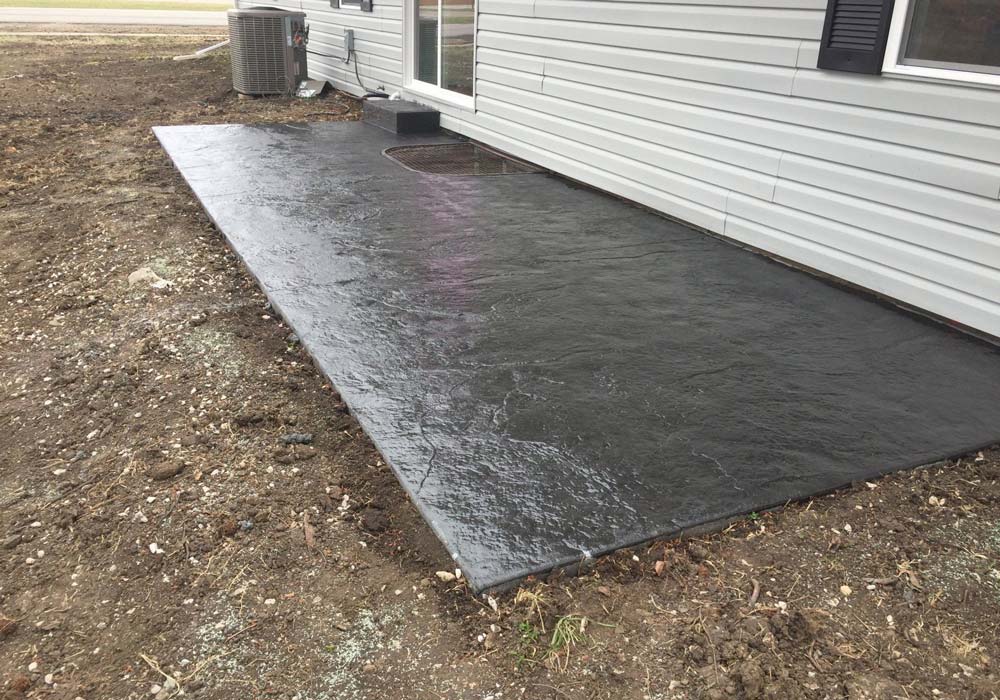 Stamped concrete patio by Ford Concrete — Kansas City