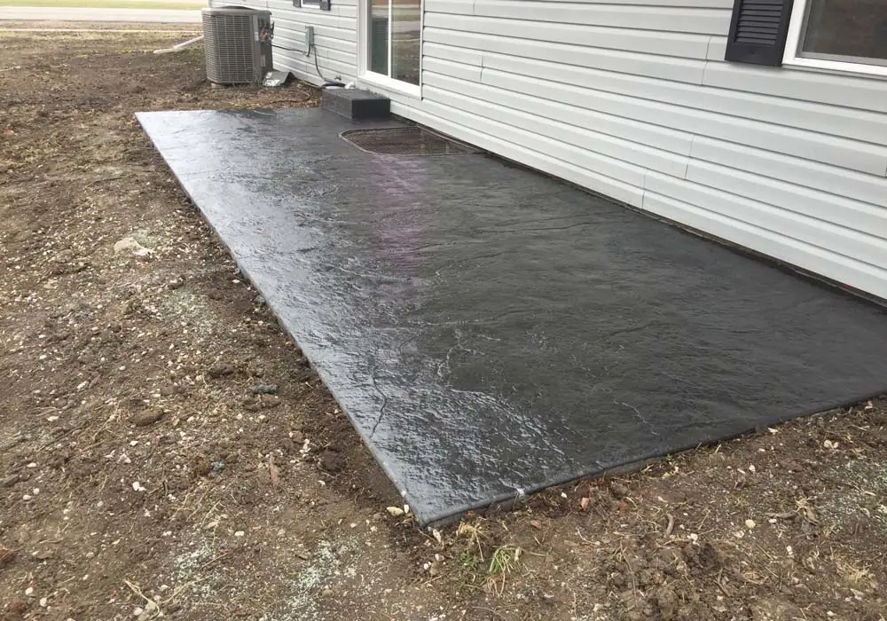 Stamped concrete patio contractor Kansas City — decorative pattern | Ford Concrete