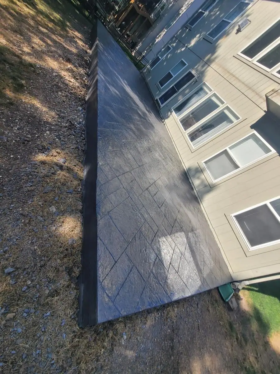 Stamped concrete tile pattern Kansas City — patio installation | Ford Concrete
